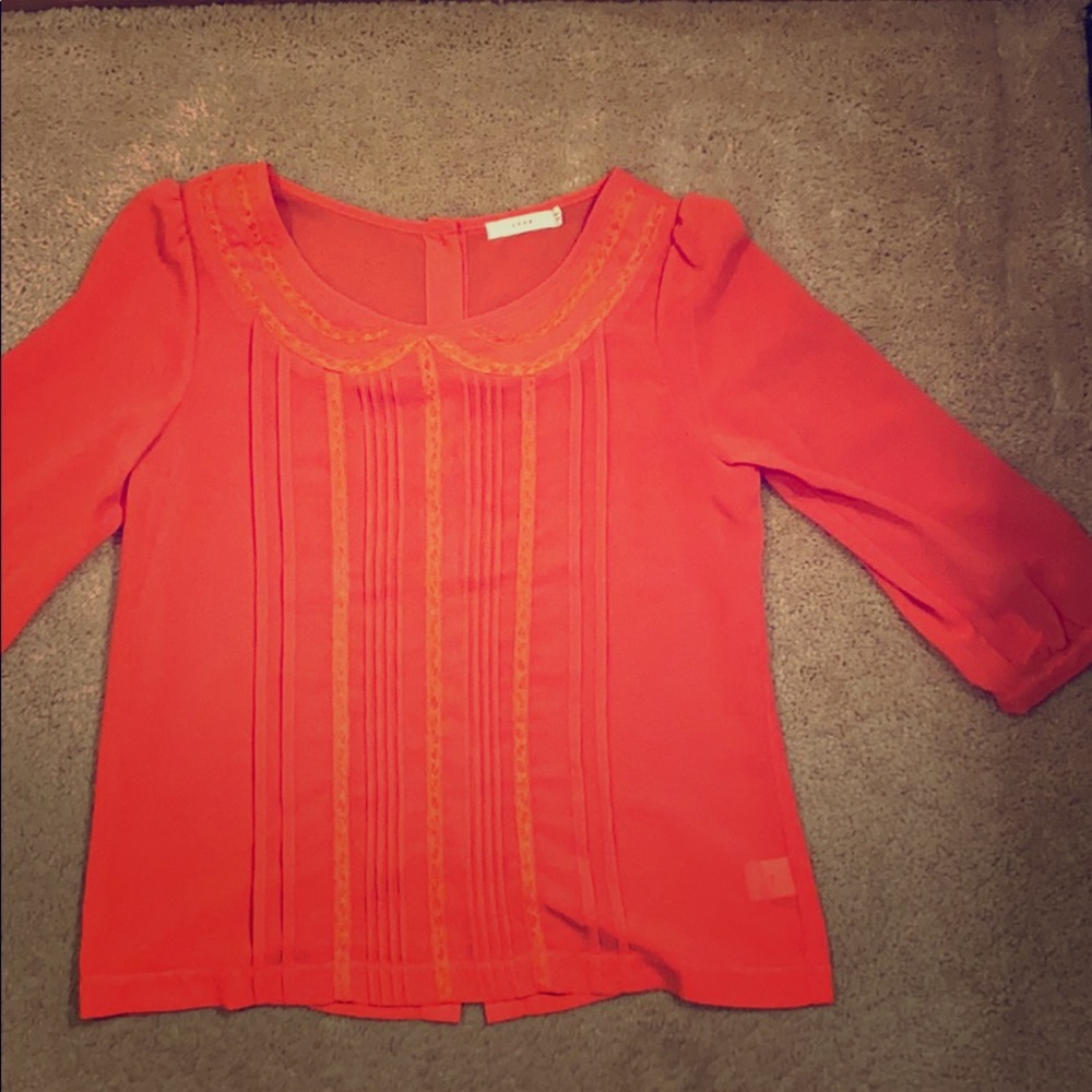 Coral dress shirt with bottom back. 3/4 sleeves